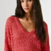 Jersey de punto calado con cuello en V