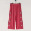 Pantalones anchos con bordado floral