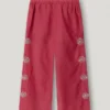 Pantalones anchos con bordado floral