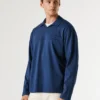 Polo de manga larga con logotipo bordado Polo de manga larga con logotipo bordado