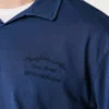 Polo de manga larga con logotipo bordado Polo de manga larga con logotipo bordado