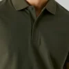 Polo de piqué con estampado en la espalda