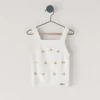 Top de punto calado con flores bordadas
