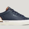 Zapatillas clásicas con detalles de ante