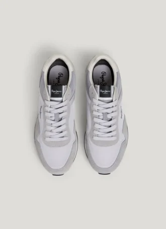 Zapatillas de cuero con detalles de ante