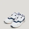 Zapatillas de cuero con detalles de ante