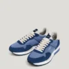 Zapatillas de cuero con detalles de ante