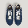 Zapatillas de cuero con detalles de ante