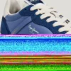 Zapatillas de cuero con detalles de ante