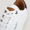 Zapatillas de cuero con detalles de ante
