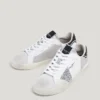 Zapatillas de piel con detalles brillantes Zapatillas de piel con detalles brillantes